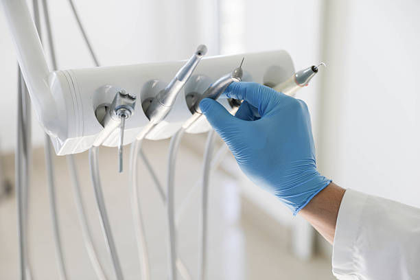 Professional Emergency Dentist technician working in Peoria, IL